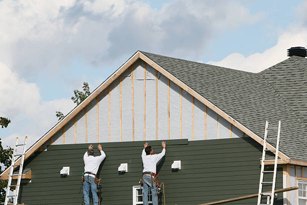 Professional Siding Installation technician working in Orrstown, PA